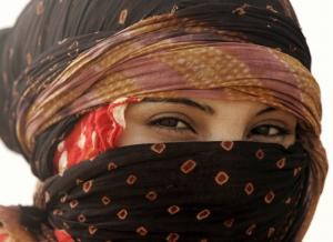 A Saharawi woman looks around at Dakhla's refugee camp,