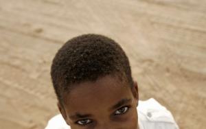 A Saharawi boy looks around at Dakhla's refugee camp,