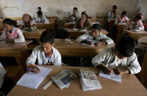 Sahrawi students attend a class in Carlo Giuliani school