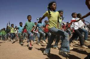 Sahrawi children take part in a demonstration as part