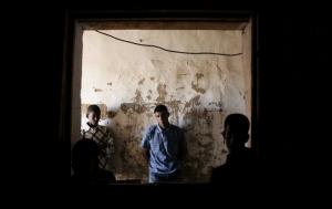 Sahrawi people wait for bread in a bakery at