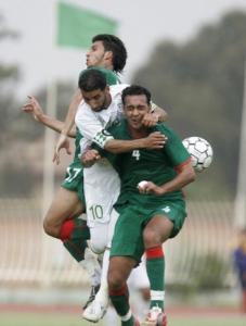Algeria's Amar Amour (C), Morocco's Abd Elouahed (front) and