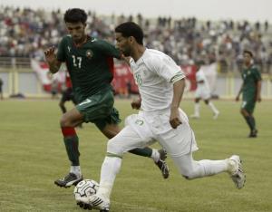 Algeria's Amar Amour (R) and Morocco's Oulhaj Mohamed (L)