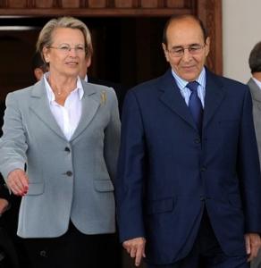 Algerian Interior Minister Noureddine Yazid Zerhouni (R) escorts his