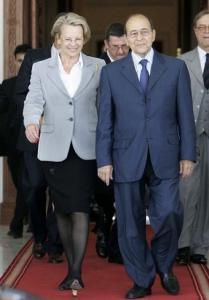 Algeria's Interior Minister Noureddine Yazid Zerhouni (R) walks with