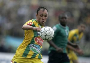 Adlane Bensaid of Algeria's JS Kabylie kicks the ball