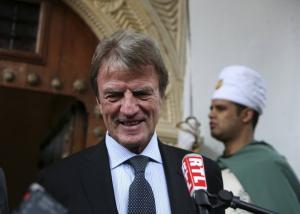 France's Foreign Minister Bernard Kouchner speaks to journalists after