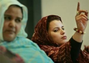 Naha Al Salek Sidi, right, speaks during a press