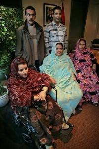 Said Abderahman, left, and Brahim Al Selem, right, stand