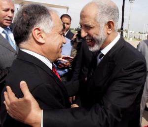 Algerian Prime Minister Abdelazziz Belkhadem (R) welcomes his Libyan