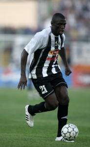 Adiko Kaita of Algeria's Entente runs with the ball