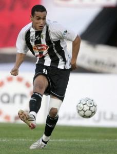 Abd elmalek Ziaya of Algeria's Entente kicks the ball