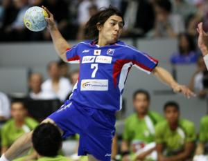 Daisuke Miyazaki of Japan shoots to score against Algeria