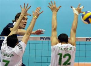 Lucas Chavez of Argentina spikes the ball against Kerboua
