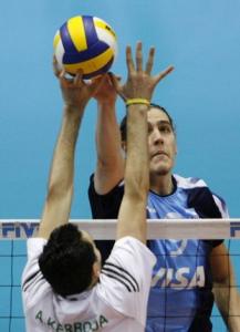 Argentina's Lucas Chavez (R) battles for the ball against