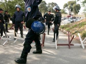 Police officers secure the area of an explosion site