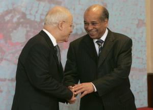 Algeria's Foreign Minister Mourad Medelci (L) and his Libyan