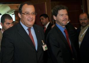 Moroccan Foreign Minister Taib Fassi Fihri (L) leaves after