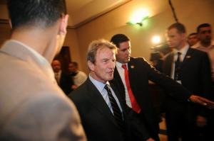 French Foreign Affairs Minister Bernard Kouchner (C) leaves after