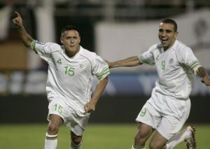 Algeria's Karim Ziani (L) and Rafik Djebbour celebrate after