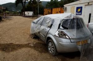 A car that was the target of a bombing,