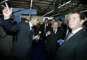 Algeria's President Abdelaziz Bouteflika (C) listens to a presentation