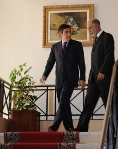 Algerian Prime Minster Abdelazziz Belkhadem (R) escorts his French