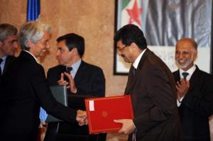 Algerian Finance Minister Karim Djoudi (2nd R) and French