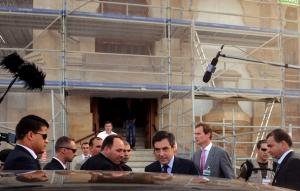 French Prime Minister Francois Fillon (C) leaves after the