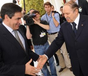 Algerian President Abdelazziz Bouteflika (R) and French Prime Minister