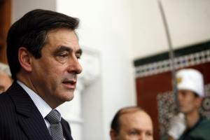 French Prime Minister Francois Fillon answers journalists' questions after