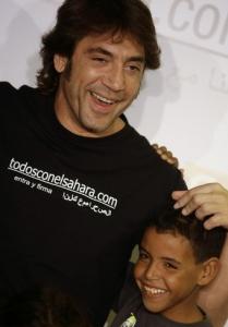 Oscar-winning Spanish actor Javier Bardem poses with a Sahrawi