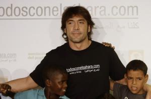 Oscar-winning Spanish actor Javier Bardem poses with Sahrawi children