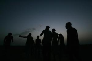 A would-be immigrant walks at the border between Morocco