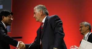 Rex Tillerson (C), chairman and chief executive officer of