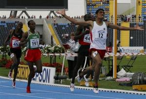 Imad Touil ,12, from Algeria celebrate after finishing first