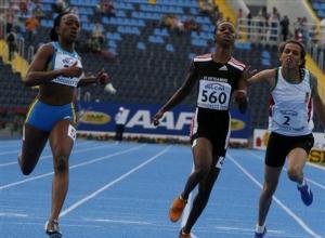 Sheniqua Ferguson ,left, from Bahamas, Meritzer Williams ,center, from