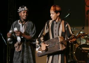 Abdelhak Ben Medjbar (R) of Algeria performs during the