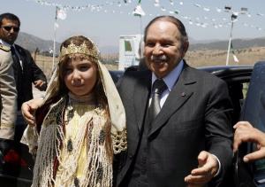 Algeria's President Abdelaziz Bouteflika poses for photograph with a