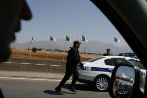 A member of the presidential security unit secures an