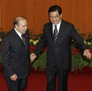 Algeria's President Abdelaziz Bouteflika (L) meets with China's President