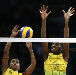 Brazil's Raouya Rouabhia (L) and Narimene Nadani reach for