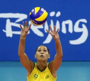 Jaqueline Carvalho of Brazil receives the ball from Algeria