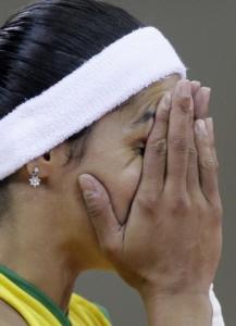Paula Pequeno of Brazil reacts during their women's preliminary