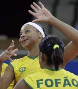 Walewska Oliveira (L) of Brazil and her team mate