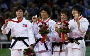 Judo medallist (L-R) An Kum Ae of North Korea