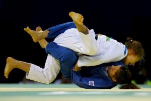 BEIJING - AUGUST 11:  Nina Koivumaki (white) of