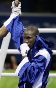 Yordenis Ugas of Cuba reacts after defeating Hamza Kramou