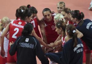 Serbia's players celebrate their win against Algeria during their