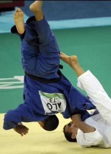 Algeria's Amar Meridja (L) and Belarus Konstantin Semenov compete